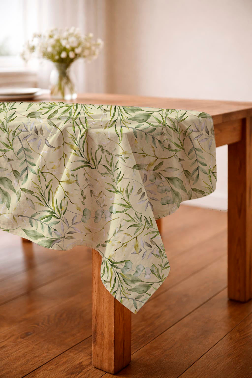 LAPERLE Green Twigs and Leaves tablecloth styled on a dining table