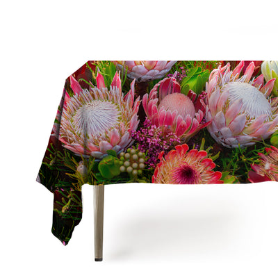 Protea themed tablecloth on dining room table