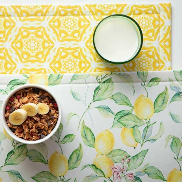 Lemons & Leaves placemats displayed with muesli