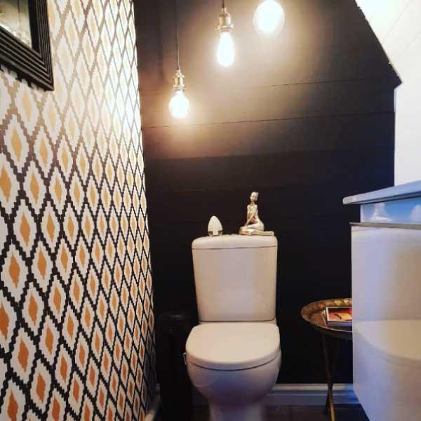 Tribal pattern in black, yellow and cream wallpaper